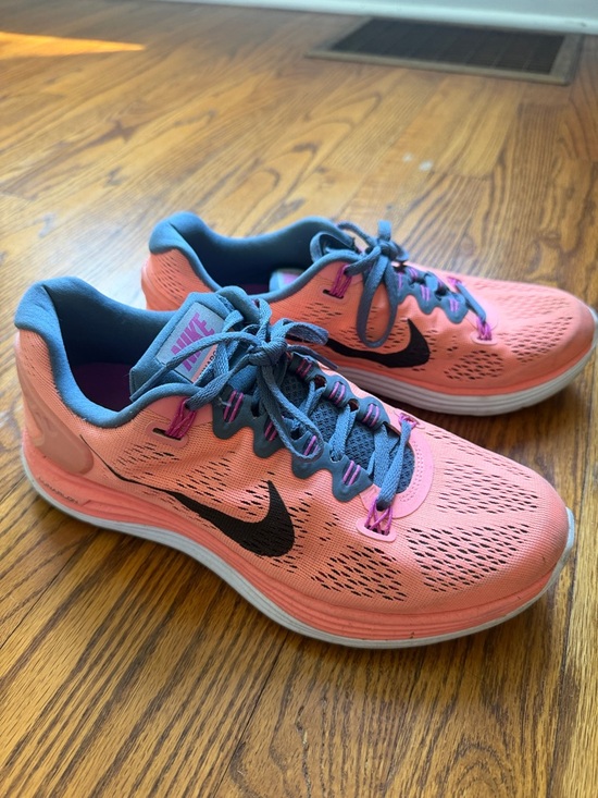Nike Shoes - Nike Women's Coral Pink Running Shoes with Black Swoosh